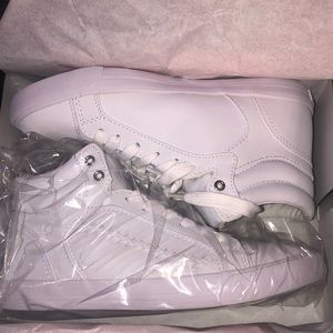 Selling high top guess sneakers ! Super cute and new ! Unfortunately didn’t fit.